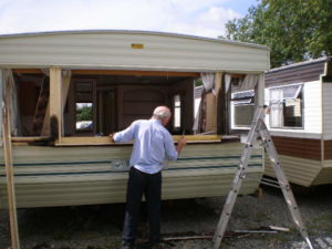 viv lewis caravans - Carrying out repairs to bay window of a static caravan